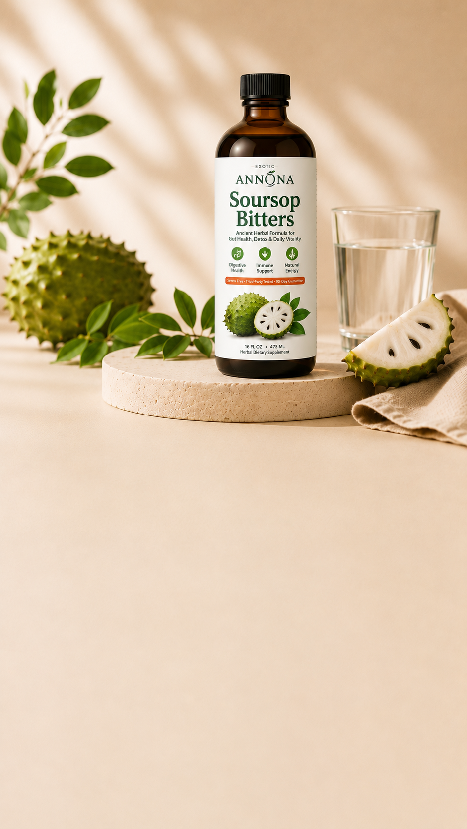 Amber dropper bottle of Annona soursop bitters with fresh soursop fruit and leaves
